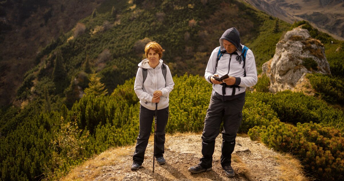 Does Menopause Cause Osteoporosis? 2 - menopause and osteoporosis middle aged woman and man hiking
